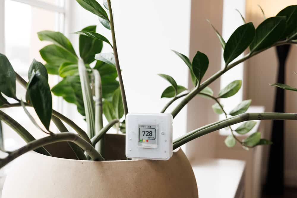 CO₂ sensor monitor. Indoor air quality sensor. Healthy work environment. Work control proper ventilation in your levels airflow in the room. Carbon dioxide levels and airflow. Smart home
