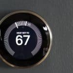 Smart home programmable thermostat from google's nest. Green tech saving heating and cooling costs