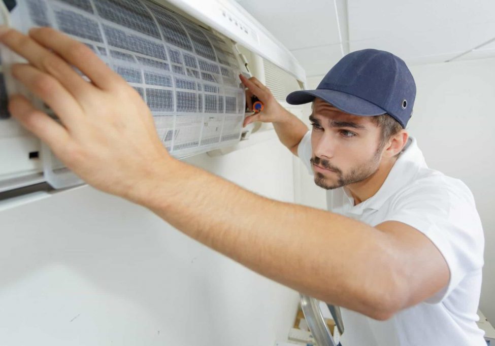 Air Conditioning Technician Installing A Unit